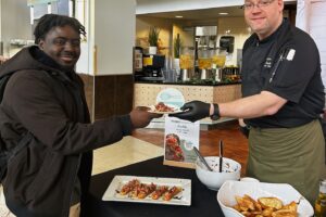 Student participating in Kitchen 101