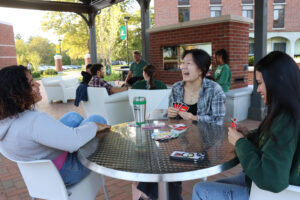 Students playing cards at McGill Terrace 