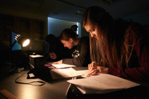 Female physics students in lab