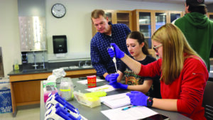 Devon Keeney working with students